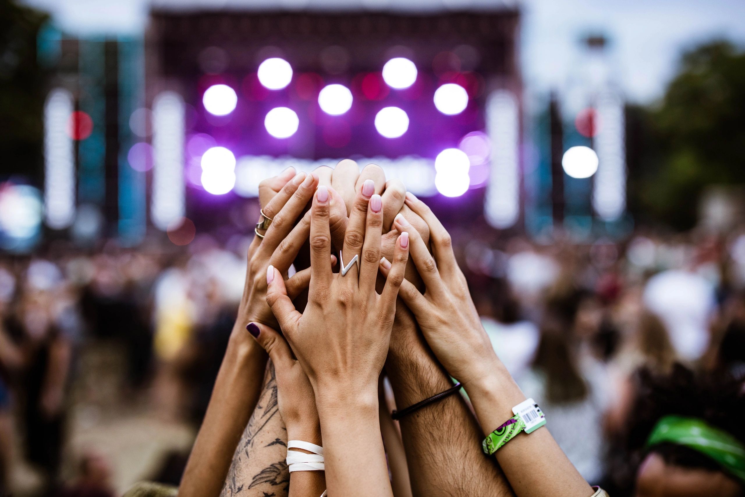 Hands raised in worship during a gathering